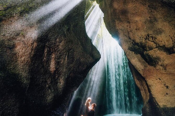 Bali Instagram Tour - Tukad Cepung Waterfall: the sun-ray moment is the point