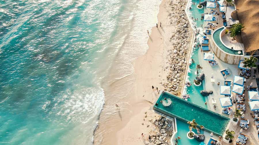 Bali: Tropical Temptation Beach Club Pass & Lounge Add-ons - Tropical Temptation Beach Club on Melasti Beach: the setting that does the work