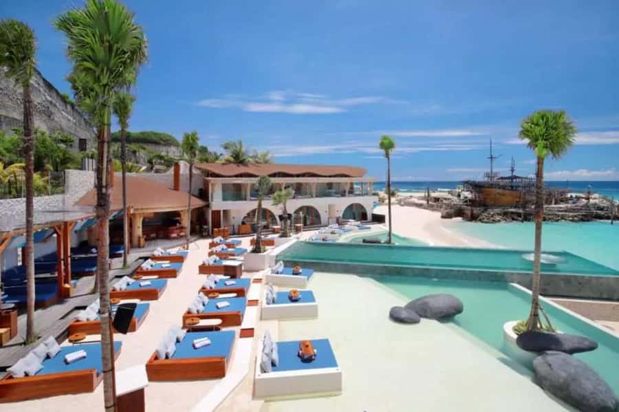 Bali: Tropical Temptation Beach Club Pass & Lounge Add-ons - Reserved daybeds and the voucher detail that matters