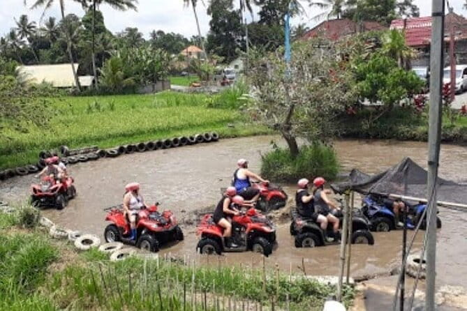 Full Day ATV Quad Bike and River Tubing Experience in Bali - River tubing in Bali: life jacket, helmet, paddle, and gentle rapids