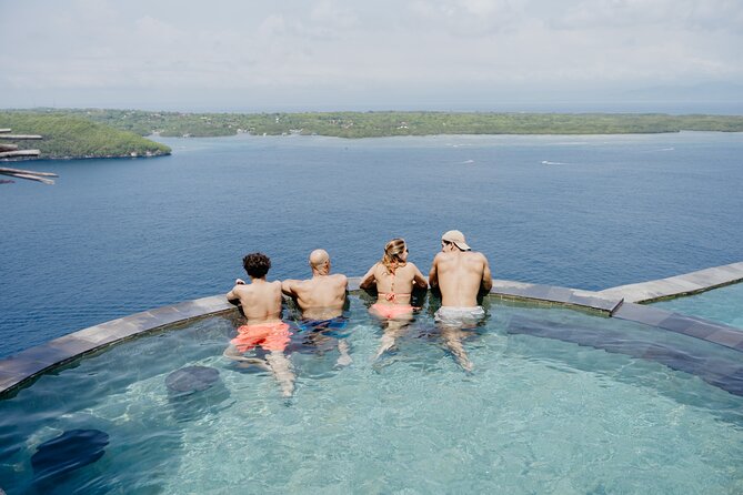 Full Day Land and Sea Tour to Nusa Penida with 4 Snorkeling Spots - Wall Bay Point drift snorkeling: the “go with the flow” stop