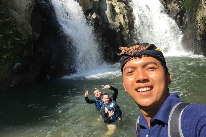 Jumping Sliding at Aling- aling Waterfall - Wanagiri Hidden Hill - Handara Gate - Handara Iconic Gate: Bali’s photo setup, timed right