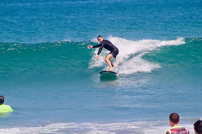 Legian Beach Bali Surf Lesson All Level 2 Hour with Pro Coach - Gear included: soft-top boards, rash guards, and easier learning