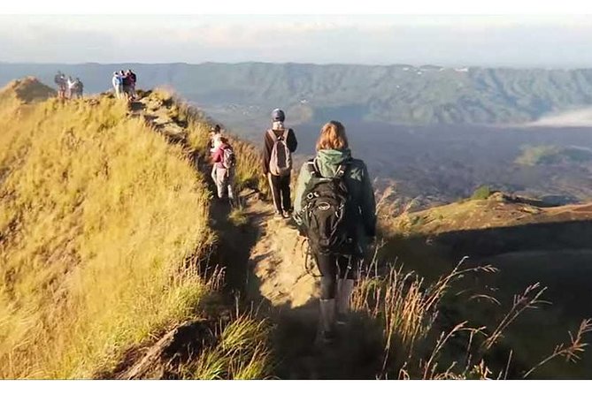 Mount Batur Sunrise Trekking with Hotel Transfers - Reaching the summit around 6 a.m.: where sunrise becomes the main character