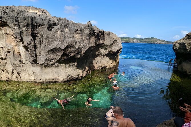 Nusa Penida Island Beach Tours with Snorkeling From Bali - Crystal Bay: palm-fringed beach plus one of the island’s known snorkel sites