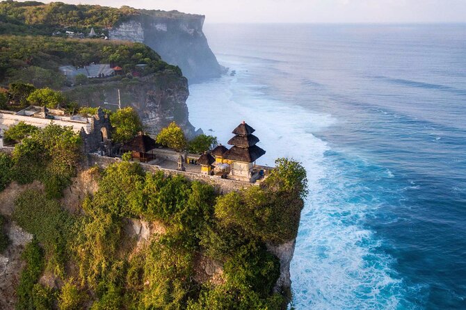 Private Tour Uluwatu Sunset Kecak Dance and Dinner at Jimbaran - Padang Padang Beach first: a surf-famous stop with real break time