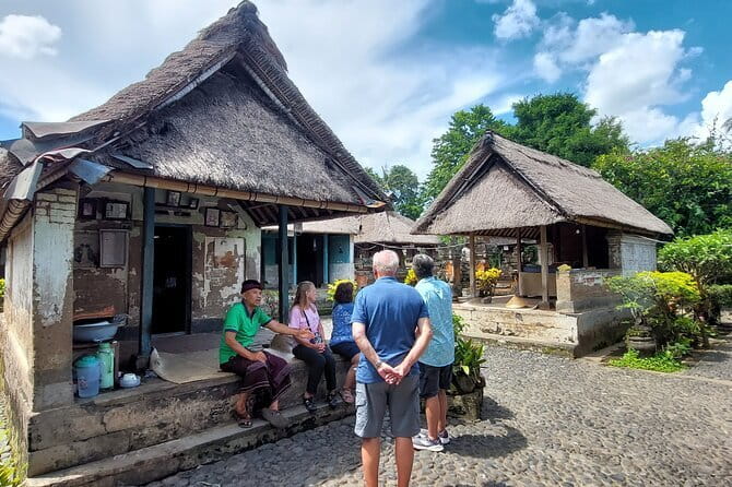 Private Tour Uluwatu Temple and Kecak Sunset Dance - Pantai Melasti Ungasan: cliffs, blue water, and rocky shore time